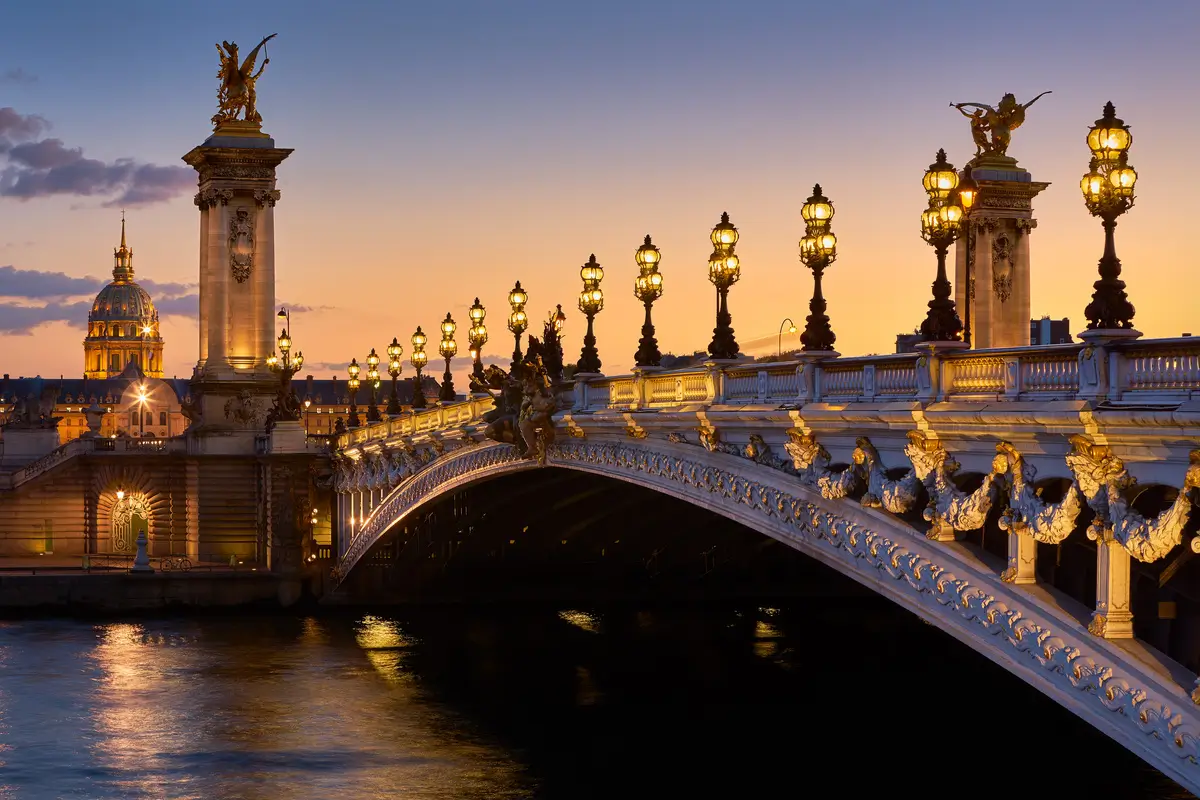 Paris Alexandre III bridge and Invalides at night